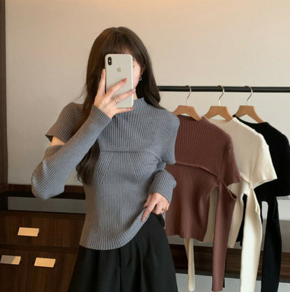 KICKSEWING（キックスウィング）ハーフネック袖スリットリブニット